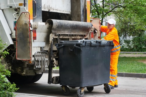 Electric low-emission collection van operating in an urban neighbourhood